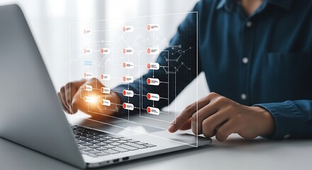 A man working on a laptop with a virtual flowchart interface represents digital technology and business innovation