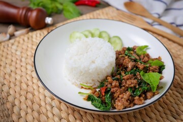 Homemade Rice topped with stir fried Thai basil with minced pork , pad ka praow moo sap