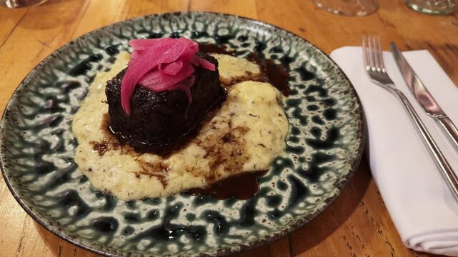 Galician beef cheek ingot with potato parmentier at the restaurant in Barcelona. High quality 4k footage
