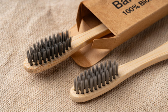 Bamboo toothbrushes on burlap for zero waste lifestyle