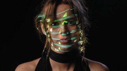 Portrait of a woman with Stock Market Data symbols projected on her face.
