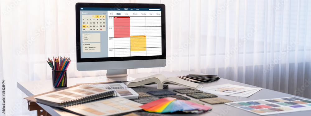 Poster interior designer workspace table and architecture software on laptop screen with mood board materia