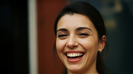 A candid portrait of a woman with thinly plucked eyebrows and glossy lips, year 2002