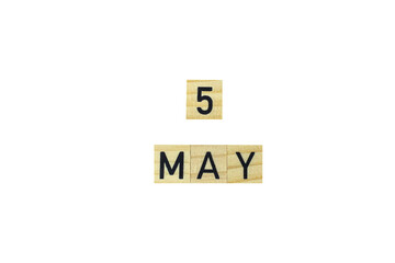 The word 5 may in wooden letters on a white background. Concept text, congratulation, spring,...
