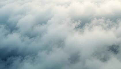 Obraz premium Dense Clouds From Above Background for Atmospheric, Serene, and Travel Concepts