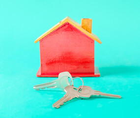 Toy red house with key, concept finance growth and property .
