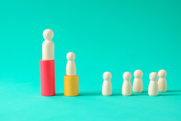 Wooden figure standing ,Concept of business leadership, successful competition.