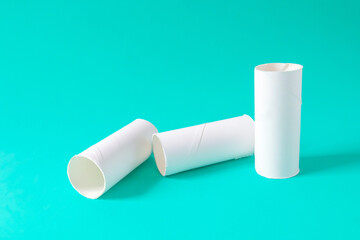 The tissue paper cores or toilet paper tubes on background.