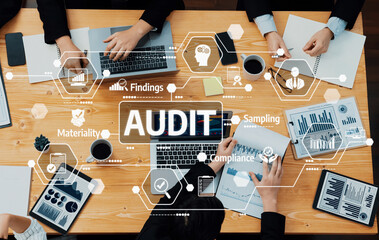 A dynamic business meeting focused on audit strategies, showcasing professionals collaborating over...