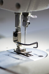 Industrial Sewing Machine and Precision Needle Mechanism in Tailor Workshop