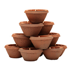 Stacked terracotta diyas with lit wicks isolated on a transparent background
