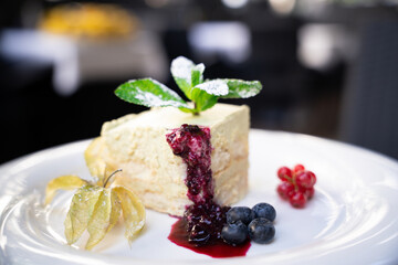 Layered dessert with berries and mint – restaurant serving