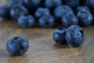 Close-up of blueberries on a wooden tray