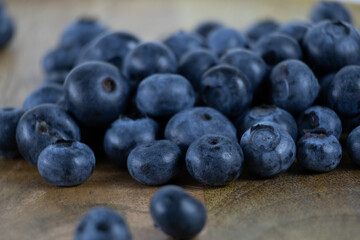 Close-up of blueberries on a wooden tray