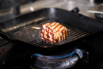Grilled meat steak on pan &ndash; close-up