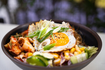 Korean beef rice bowl with fried egg – front view