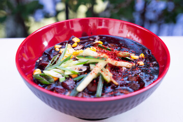 Jajangmyeon black bean noodles – Korean dish in bowl, front view