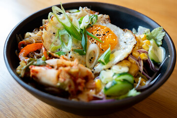 Korean bibimbap bowl with fried egg