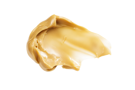 a piece of butter sitting on top of a white surface