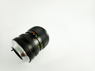 Close-Up of a Vintage Zoom Camera Lens on White Background