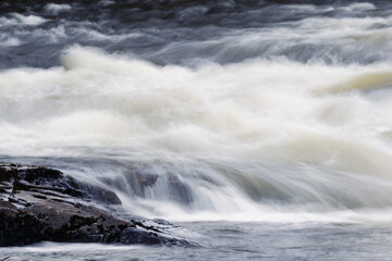 Flowing long exposure water at Klingforsen, Idre