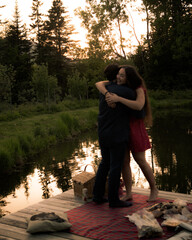 couple hugging at sunset