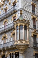 Fototapeta premium Beautiful building at La Rambla Nova, Tarragona, Catalonia, Spain. Iconic architecture in the heart of the city’s vibrant promenade.