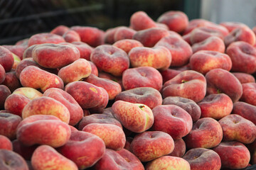 peaches on a market stall