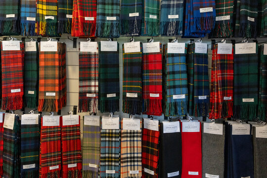 Lochcarron, Scotland; scalfs in traditional tartan pattern from Lochcarron, made in Scotland, 100% lamb wool