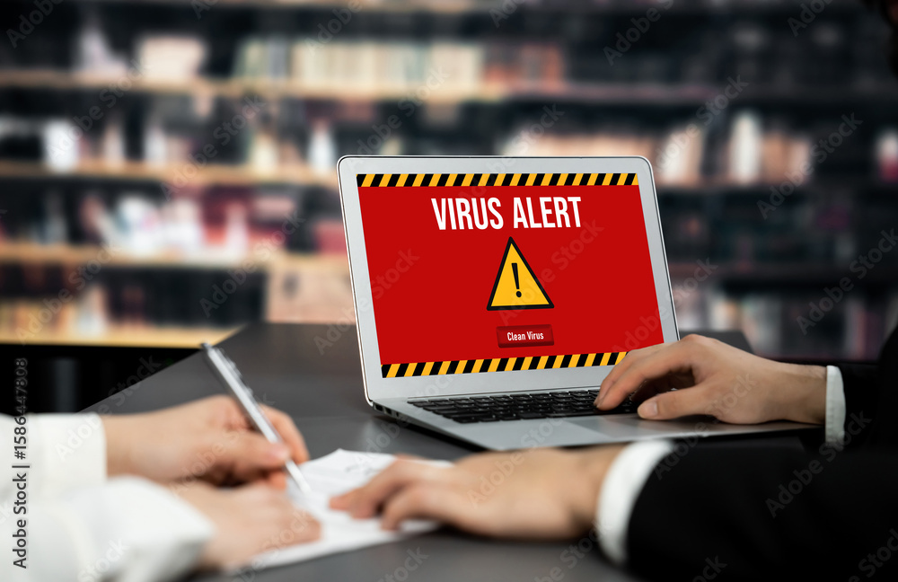 Poster virus warning alert on computer screen detected brisk cyber threat , hacker, computer virus and malw