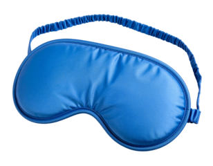Soft, padded blue sleeping mask with gentle curve and elastic strap, lying flat in