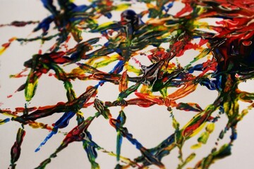 Color spots on a light background.