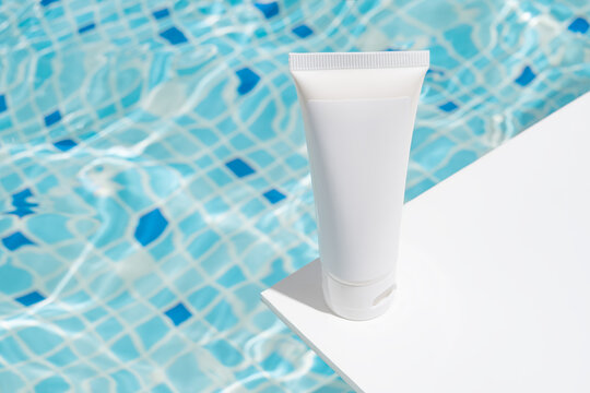 Cosmetics by the poolside in a refreshing summer setting