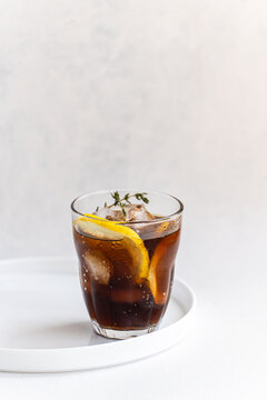 Refreshing gin cocktail with lemon and thyme