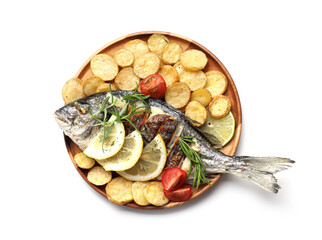Tasty roasted dorado fish with potatoes, tomatoes and lemon isolated on white, top view. Homemade...