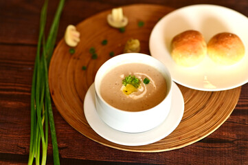 Cream of Chicken Mushroom Soup Served with Fresh Bread Roll