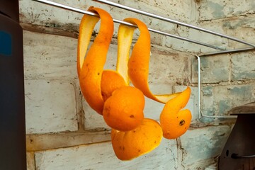 Orange peels hang to dry. A pleasant rustic colonial setting.