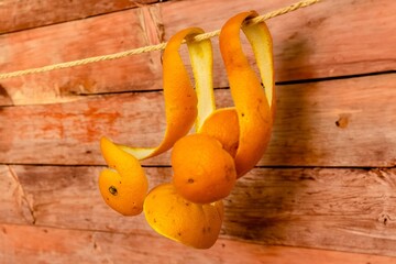 Orange peels hang to dry. A pleasant rustic colonial setting.