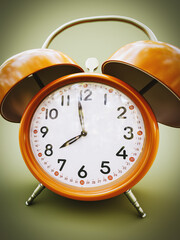 Orange alarm clock on green background. 3D Rendering, 3D Illustration