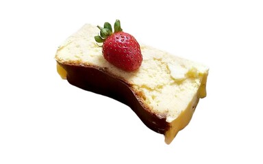 A cake slice topped with a strawberry is on a white background. The cake has a dark chocolate layer.