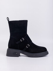 Discover the Stylish Black Suede Ankle Boots featuring unique Strap Details, perfect for setting your footwear fashion trends and elevating any outfit with a touch of elegance and sophistication