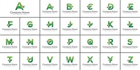 Collection of green alphabet letter logos with leaf and orange dot accents for eco friendly businesses