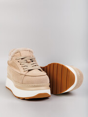 Introducing our Stylish Beige Platform Sneakers that are perfect for modern footwear enthusiasts....