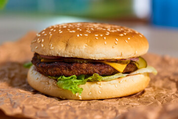 Fastfood close -up: Fresh Burger with meat and vegetables