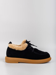 Experience the perfect blend of fashion and comfort with these stylish Black and Tan Faux FurLined...