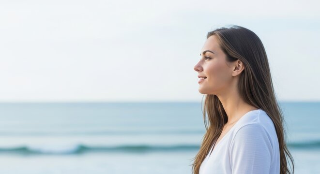 Serene Woman Gazes at Ocean View