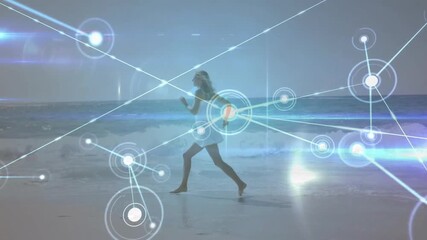 Woman running barefoot on wet sand activating pulsing nodes and expanding digital network overlay - Powered by Adobe