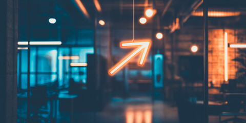 Neon upward arrow sign in modern office interior