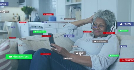 Senior woman on couch scrolling smartphone and creating floating icons for social media updates - Powered by Adobe