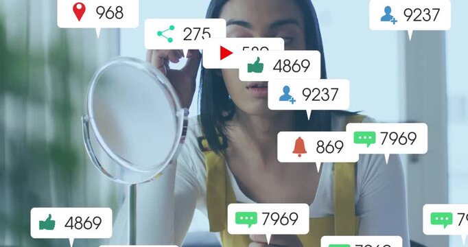 Beauty creator applying mascara and causing social icons floating around mirror celebrating growth